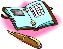 A pen resting by an open agenda or personal calendar.