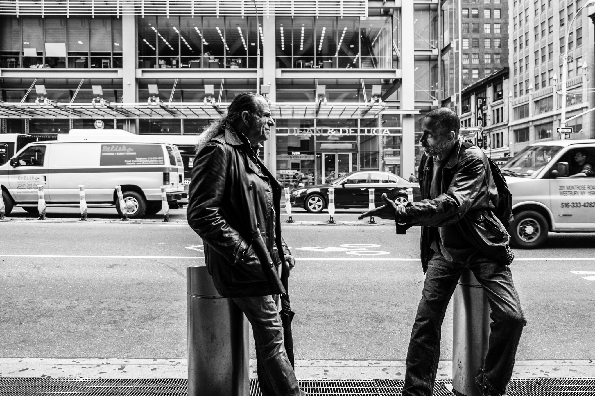 Photograph: two people having a verbal exchange on the sidewalk Reproduced with attribution under Creative Commons license.