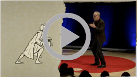 Image of the play icon that overlays on top of Adam Savage standing on the TED stage giving his talk , How Simple Ideas Lead to Scientific Discoveries