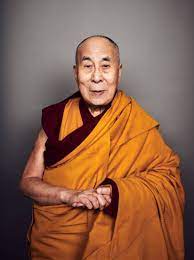 Photo of man Dalai Lama in Gold Maroon Robes